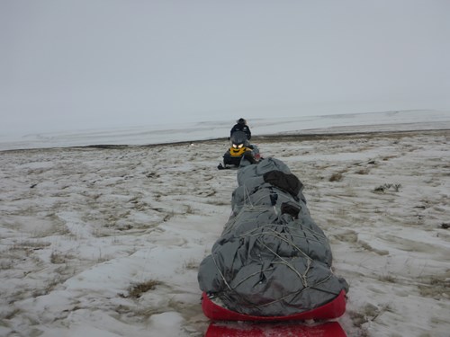 Riding over thin melting snow cover South of Teshekpuk Lake